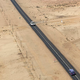 Two cars driving at each other in the desert.